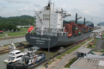 Panama Canal transit with a container ship entering the Miraflores Locks
