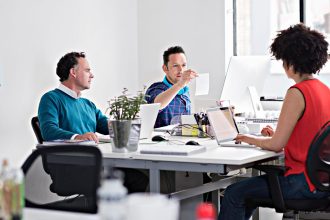 Business founders completing limited company registration following growth in UK startup applications