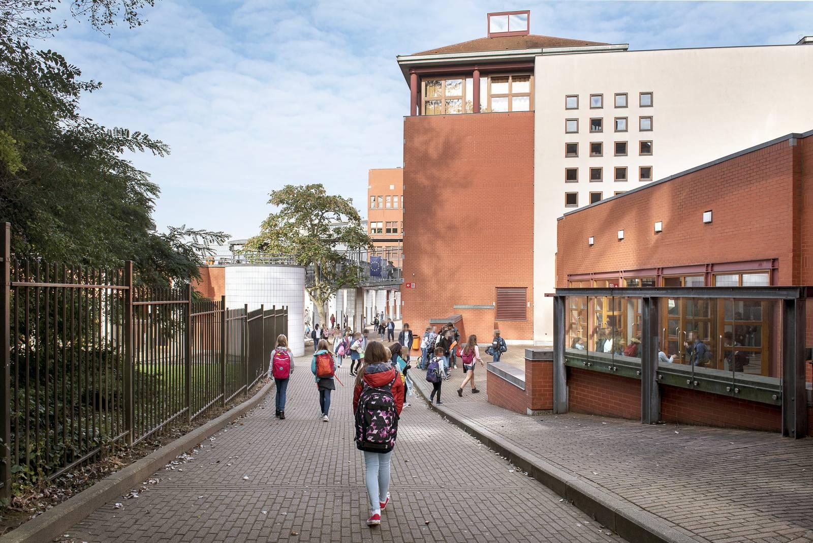 Belgian education reform as students and parents attend a school event near Brussels