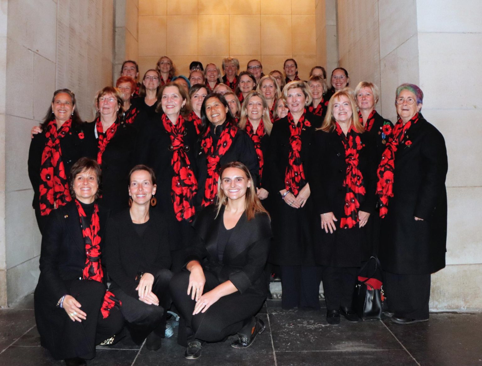 Members of the Belgium Military Wives Choir performing during a remembrance ceremony in Belgium in 2026