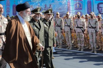 Iran leadership update showing Tehran skyline and government buildings during security shift 2026