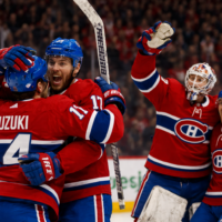 Montreal Canadiens erupt in celebration after stunning comeback performance.