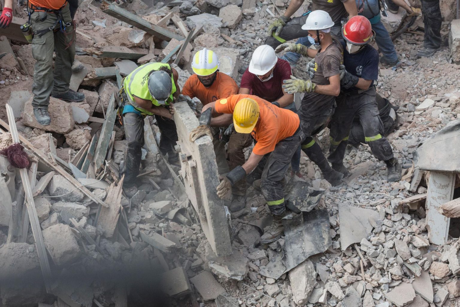 Lebanon civilian casualties Beirut destruction smoke buildings