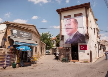 Nicosia / Northern Cyprus - August 15, 2019: portrait of Turkish President Erdogan hanging on a building in the part of Nicosia belonging to North Cyprus