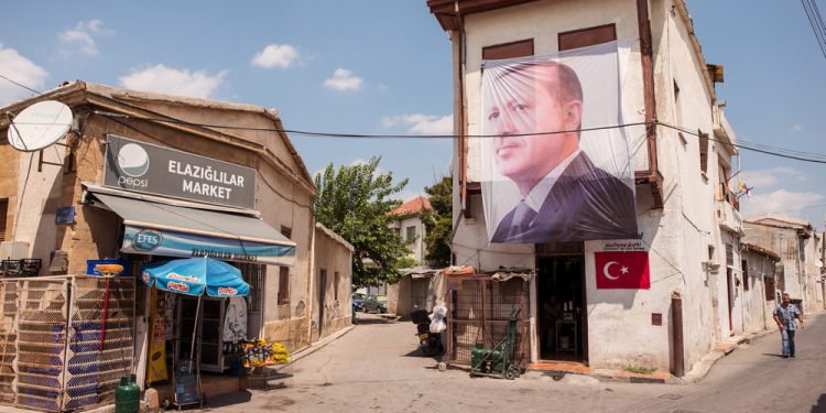 Nicosia / Northern Cyprus - August 15, 2019: portrait of Turkish President Erdogan hanging on a building in the part of Nicosia belonging to North Cyprus