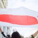 MINSK, BELARUS - August 13, 2020: Peaceful protest in Minsk. Flag of Belarus. White red white