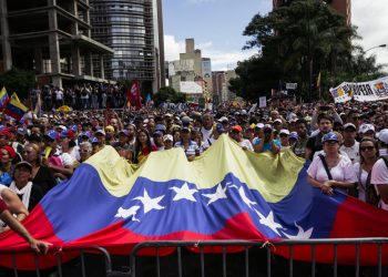Caracas, Capital District/Venezuela; 01-23-2019: Group of protesters shows their support for Juan Guaido. During his oath