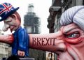 London, U.K., 03/23/2019, March for a “People’s Vote” on Brexit. Cartoon model of Theresa May impaling a Brit with her nose, marker Brexit.