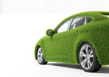 Green, ecofriendly transport concept - grass covered car.