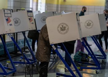 NEW YORK, NY – NOVEMBER 03: People cast their vote for the 2020 U.S Presidential Election at a polling site in Manhattan on November 3, 2020 in New York City.