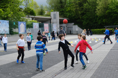 Kids,Play,Footbal,In,School's,Courtyard,In,Brussels,,Belgium,On
