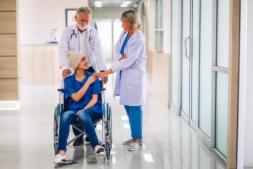 Professional,Medical,Doctor,Team,With,Stethoscope,In,Uniform,Discussing,With