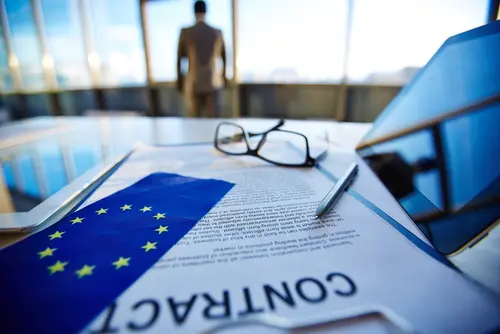 International,Contract,With,Pen,,Flag,Of,European,Union,,Digital,Tablets