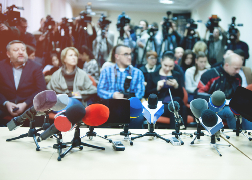 Press,Conference.,News,Conference,With,Tv.,Interview,With,A,Video