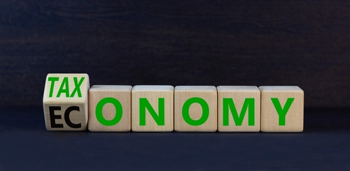 Taxonomy,Or,Economy,Symbol.,Turned,Wooden,Cubes,And,Change,The