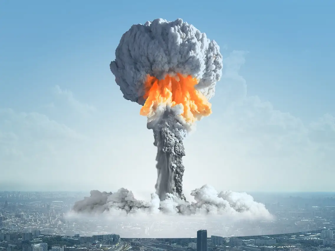An illustration of a nuclear bomb exploding in a city