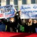 KYIV, UKRAINE - Feb. 22, 2022: The empire must die. Protest action near the Embassy of the Russian Federation in Kiev. Text - Empire must die, Ukraine will defend
