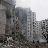 Israel air strike Lebanon explosion scene in southern region with smoke and damage