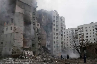 Israel air strike Lebanon explosion scene in southern region with smoke and damage