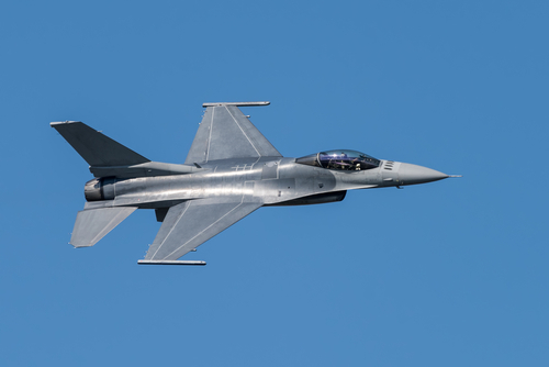 F-16,Fighting,Falcon,Silhouette,In,Clear,Blue,Sky,With,Fighter