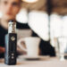 Using electronic cigarette to smoke in public places.Smoke restriction,smoking ban.Using vaping device with flavoured liquid.E-juice vaping new technology.Give up tobacco.Smoking habit,nicotine addict