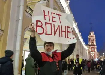 St Petersburg, Russia 02-24-2022: rally against the war with Ukraine, man holds a poster with the inscription in Russian "no war"