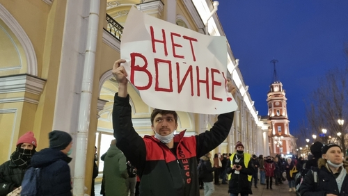 St Petersburg, Russia 02-24-2022: rally against the war with Ukraine, man holds a poster with the inscription in Russian "no war"