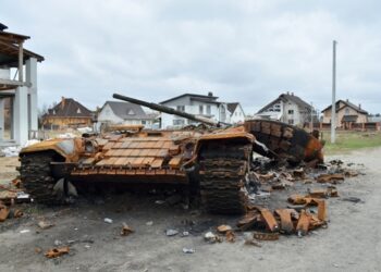 Dmytrivka village, Kyiv region, Ukraine - April 13, 2022: Destroyed Russian tank following the Ukrainian forces counter-attacks.