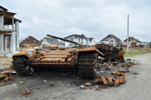 Dmytrivka village, Kyiv region, Ukraine - April 13, 2022: Destroyed Russian tank following the Ukrainian forces counter-attacks.