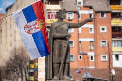 Serbian,Flag,Infront,Of,Prince,Lazar,Hrebljanovic,Of,Serbia,Statue