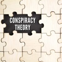 Wooden,Puzzle,With,The,Word,Conspiracy,Theory