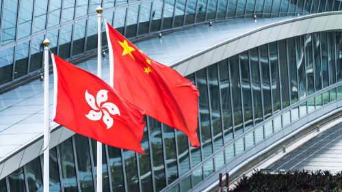 Hong,Kong,And,Mainland,China,National,Flags,Stand,Together,With