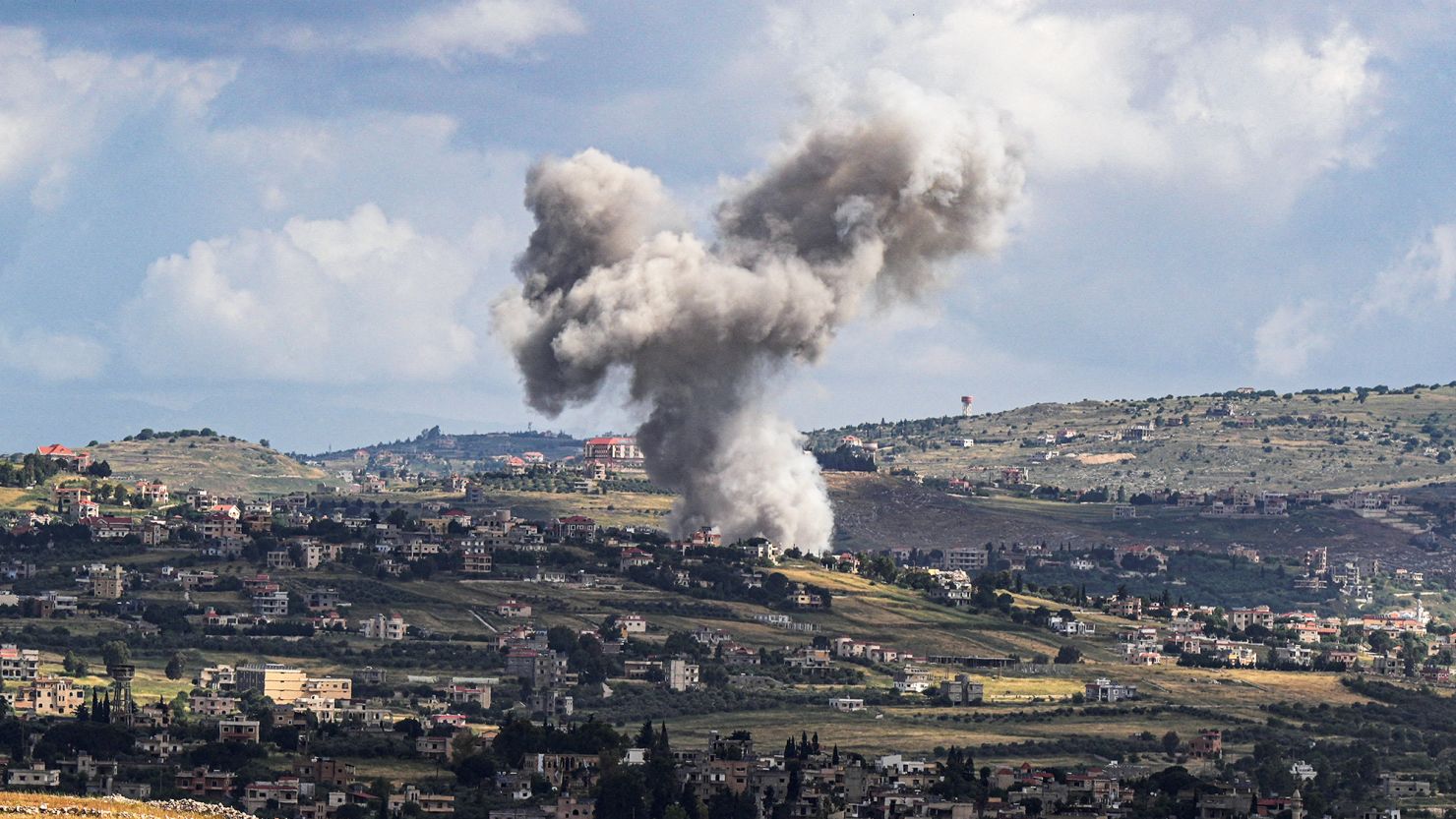 Israel military headquarters strike with smoke rising over military base