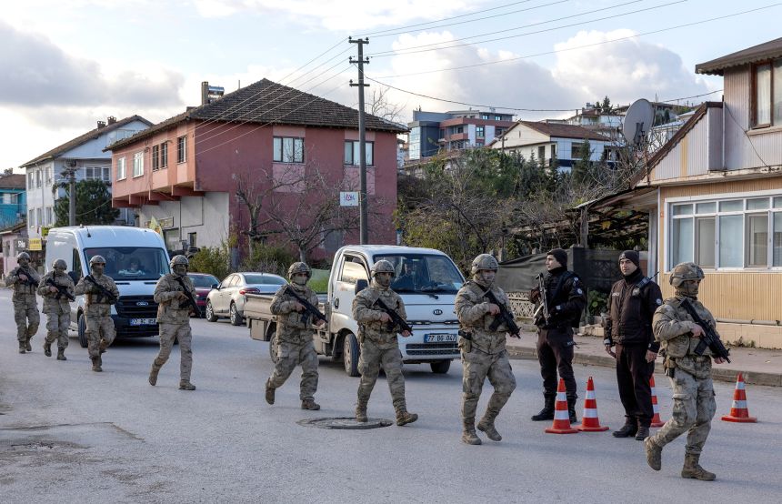 Turkish police security monitoring consulate area in daylight
