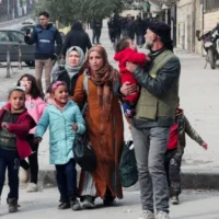 Neighbourhood damage following Aleppo ceasefire failure
