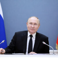 Russian President Vladimir Putin addressing the media during his annual Q&A, stating no land negotiations with Ukraine