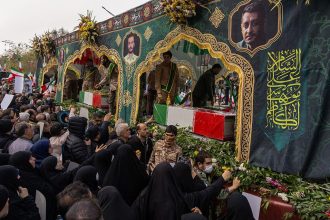 Iran funeral security chiefs ceremony in Tehran with massive crowd and military honors