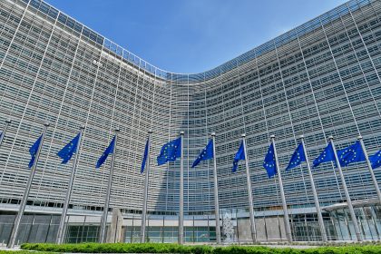 EU skills shortage raises concerns over workforce training and competitiveness as European Union flags fly in Brussels.