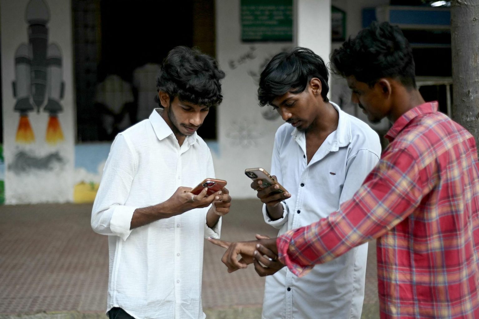 Indian Gen Z voters using smartphones to follow India election updates