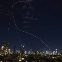 Middle East missile attacks impact urban areas in Israel with visible damage and emergency response