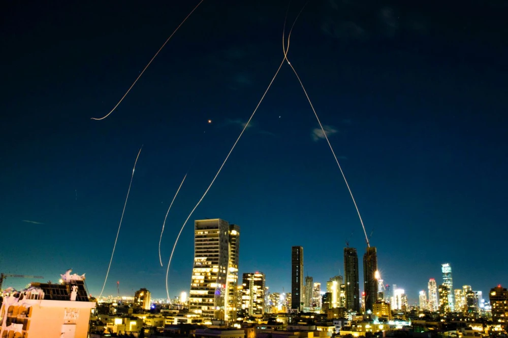 Missile attack Israel seen over Tel Aviv skyline during night escalation in 2026