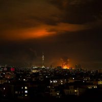 Tehran skyline during Iran civilian infrastructure attacks crisis 2026