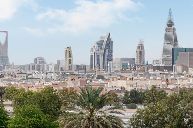 Riyadh explosions news coverage illustrated by modern buildings in Saudi Arabia's capital.