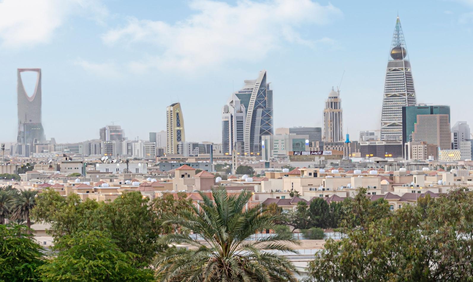 Riyadh explosions news coverage illustrated by modern buildings in Saudi Arabia's capital.