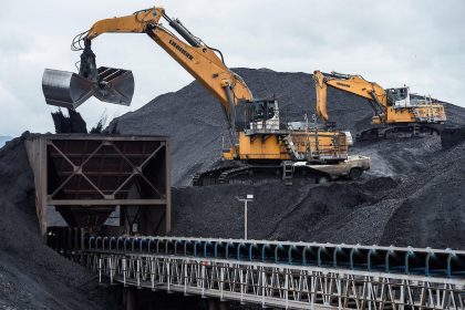 Heavy mining equipment operating at a Coal India mine as part of sustainable coal mining modernization efforts