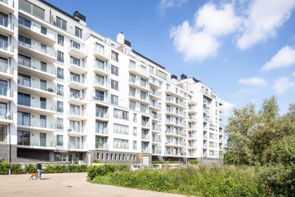 Brussels Housing Funding dispute raises concerns over residential construction and public housing.