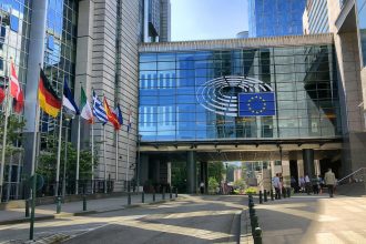 Brussels fatal shooting near European Parliament raises security concerns on Rue Wiertz.