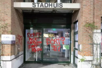 A man vandalises Izegem city hall with swastika