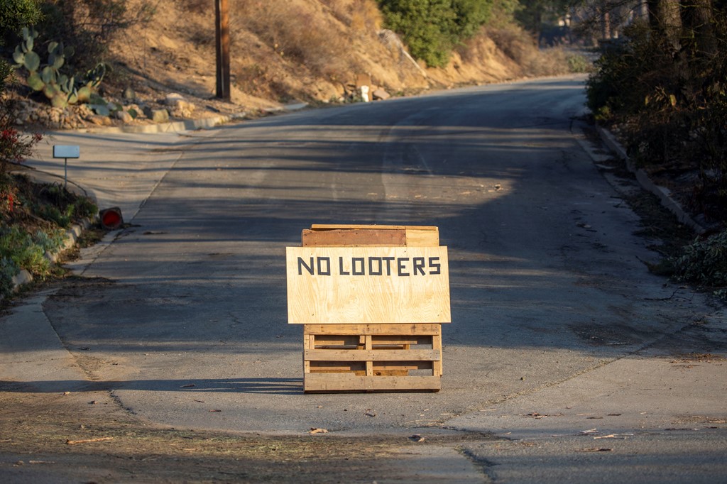 A sign on a road after residents fled