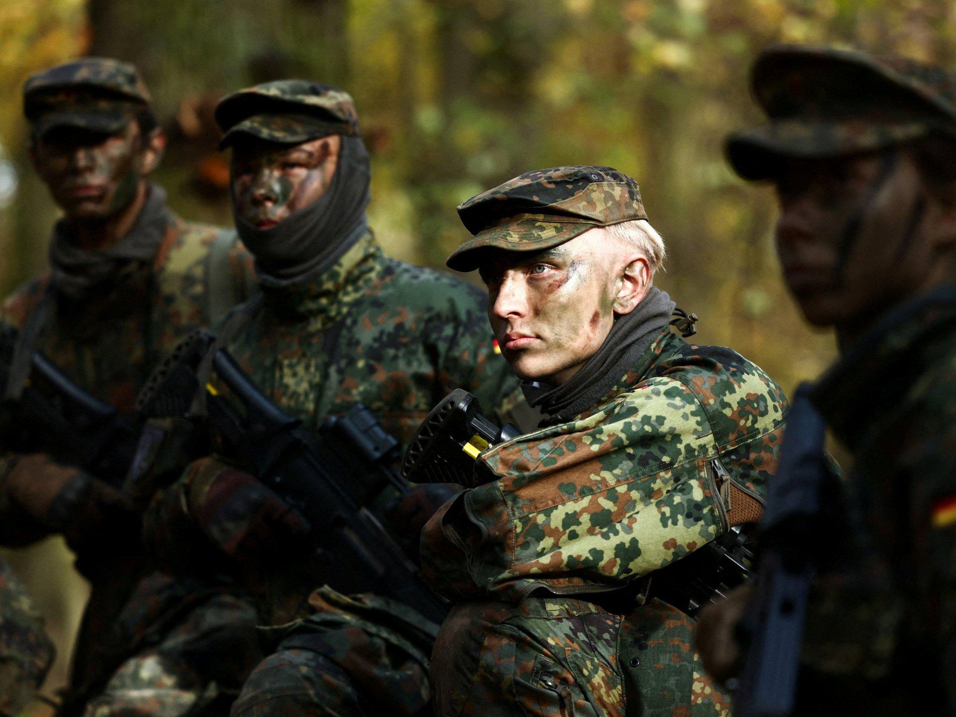 NATO officials discussing Germany defense spending and European security